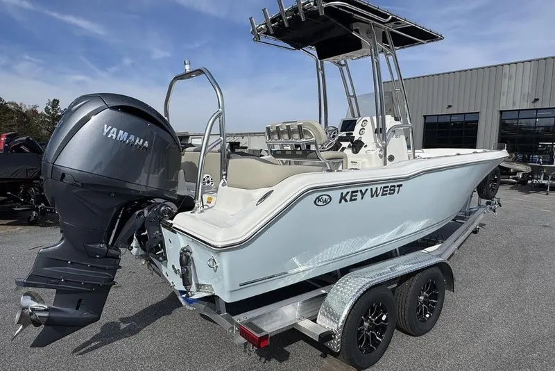 Slide: The Image of 2026 Key West 203 FS boat with Yamaha engine on trailer, outdoor setting. - 4