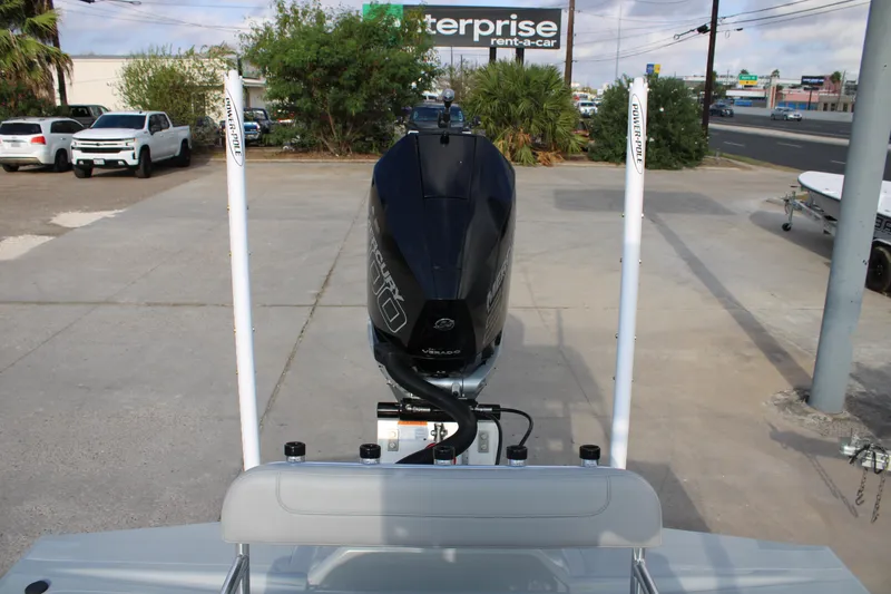 Slide: The Image of 2026 Mamba 24 Cat Elite boat with Mercury engine, parked outdoors near Enterprise Rent-A-Car. - 9