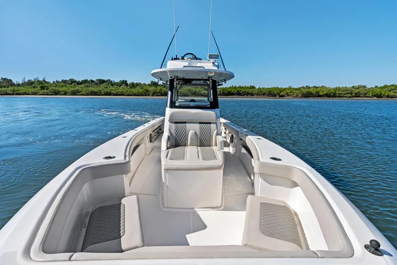 Slide: The Image of 2025 Solace 32 CS boat interior with dual seats and modern design. - 11