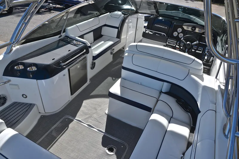 Slide: The Image of 2016 Formula 350 Crossover Bowrider interior with luxurious seating and modern dashboard. - 19