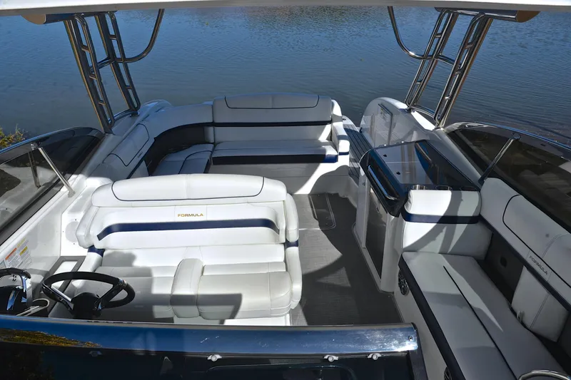 Slide: The Image of 2016 Formula 350 Crossover Bowrider interior with luxurious seating and sleek design. - 23