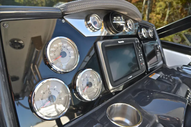 Slide: The Image of Dashboard of 2016 Formula 350 Crossover Bowrider with gauges and navigation system. - 31