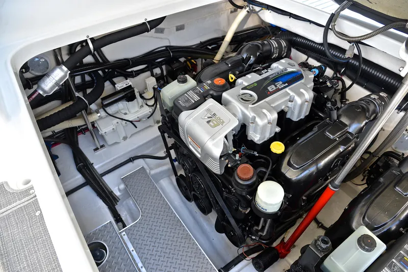 Slide: The Image of Engine compartment of a 2016 Formula 350 Crossover Bowrider, featuring a powerful V8 engine. - 36