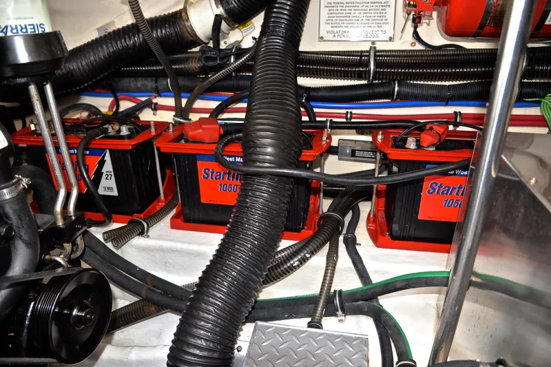 Slide: The Image of Engine compartment of 2016 Formula 350 Crossover Bowrider with batteries and wiring. - 39