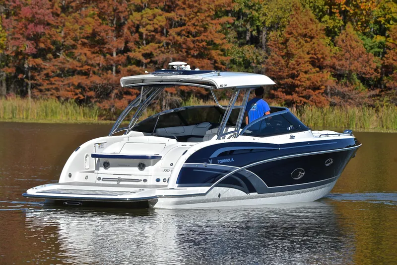 Slide: The Image of 2016 Formula 350 Crossover Bowrider on a serene lake with autumn foliage. - 9