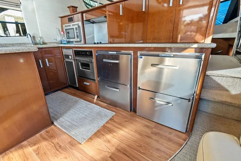 Slide: The Image of Luxurious kitchen interior of 2009 Carver 56 Voyager SE yacht with modern appliances. - 17