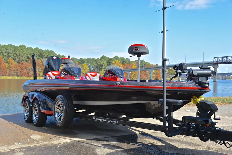 Slide: The Image of 2020 Ranger Z521L boat on trailer by scenic lake with autumn trees. - 16
