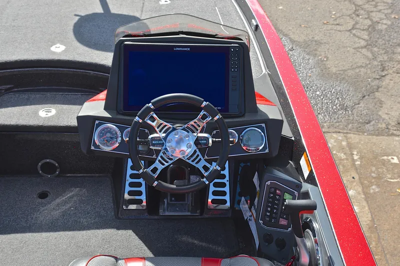 Slide: The Image of 2020 Ranger Z521L boat dashboard with steering wheel and electronic display. - 24