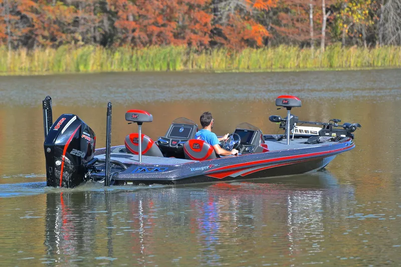 Slide: The Image of 2020 Ranger Z521L boat on a calm lake with autumn foliage background. - 8
