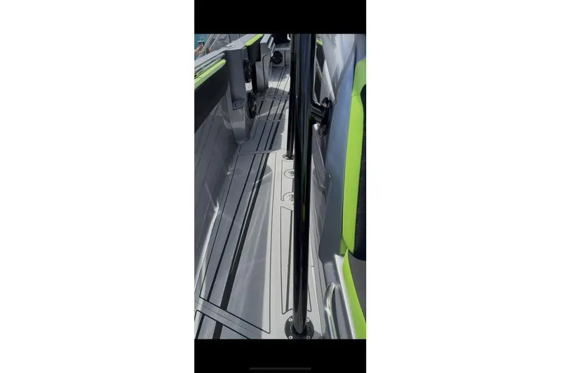 Slide: The Image of 2026 Nor-Tech 390 Sport Center Console interior with sleek design and vibrant accents. - 3