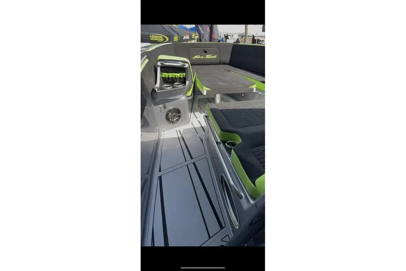 Slide: The Image of 2026 Nor-Tech 390 Sport Center Console interior with sleek seating and modern design. - 6