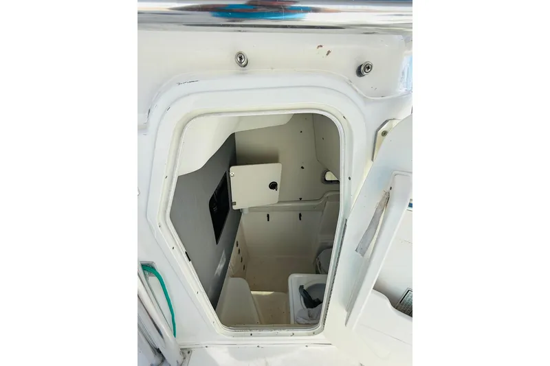 Slide: The Image of Interior view of a 2005 Century 3200 Center Console boat cabin. - 14