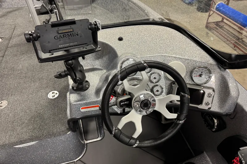 Slide: The Image of 2026 Nitro ZV19 Sport Pro dashboard with Garmin mount and steering wheel. - 10