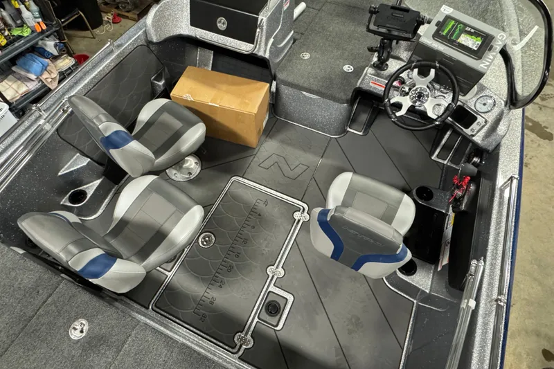 Slide: The Image of 2026 Nitro ZV19 Sport Pro boat interior with four seats and a steering console. - 16