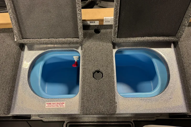 Slide: The Image of Livewell compartments in 2026 Nitro ZV19 Sport Pro boat, featuring pump-out feature. - 17