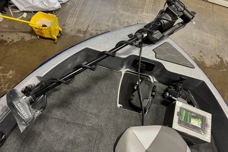 Slide: The Image of 2026 Nitro ZV19 Sport Pro boat with Garmin electronics and trolling motor setup. - 24