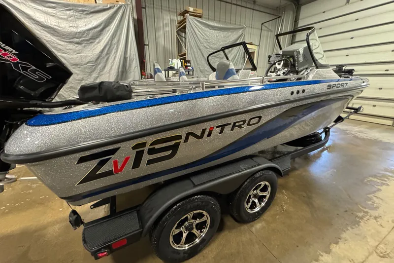 Slide: The Image of 2026 Nitro ZV19 Sport Pro boat in a garage, showcasing sleek design and modern features. - 5