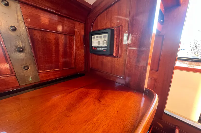 Slide: The Image of Wooden interior of 1966 Moody Salar Motorsailer with control panel. - 15