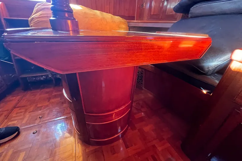 Slide: The Image of Vintage 1966 Moody Salar Motorsailer interior with polished wooden table and seating. - 18