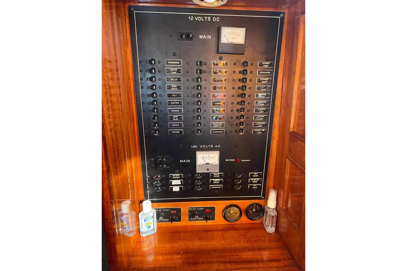 Slide: The Image of Electrical panel on a 1966 Moody Cutter boat with various switches and meters. - 22