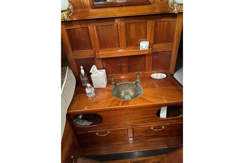 Slide: The Image of Wooden vanity with sink in 1966 Moody Salar Motorsailer cabin. - 9