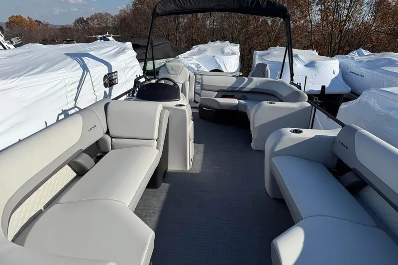 Slide: The Image of 2026 Lowe SF 232 Sport Fish boat interior with spacious seating and modern design. - 16