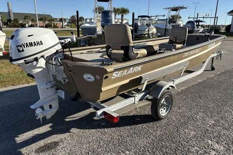 Slide: The Image of 2025 SeaArk DXS 1548 DKLD boat on trailer with Yamaha outboard motor. - 3