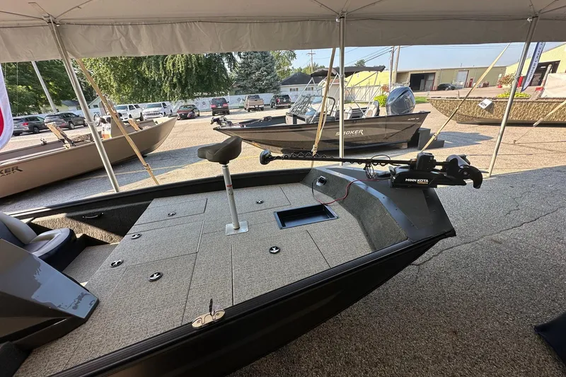 Slide: The Image of 2026 Smoker Craft VIPER 175 boat interior with seating and storage compartments. - 7