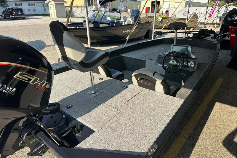 Slide: The Image of 2026 Smoker Craft VIPER 175 boat with Yamaha engine, featuring spacious seating and modern dashboard. - 9