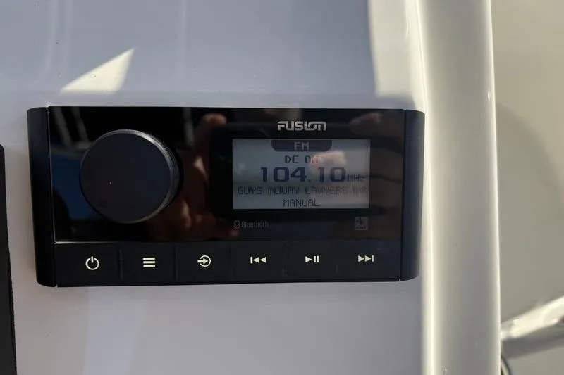 Slide: The Image of Fusion marine radio display on 2026 Bulls Bay 2200 XS boat dashboard. - 17