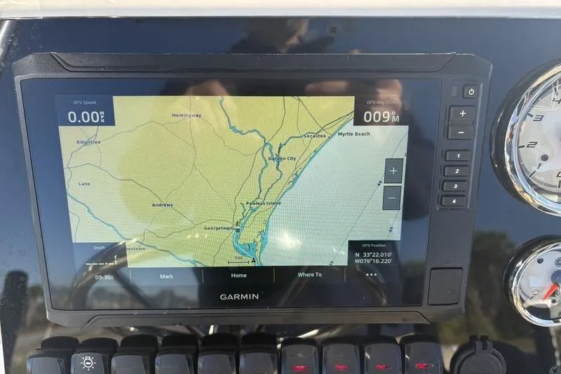Slide: The Image of Garmin GPS display on 2026 Bulls Bay 2200 XS boat, showing coastal navigation map. - 18