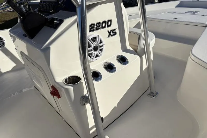 Slide: The Image of 2026 Bulls Bay 2200 XS boat interior with console and cup holders. - 19