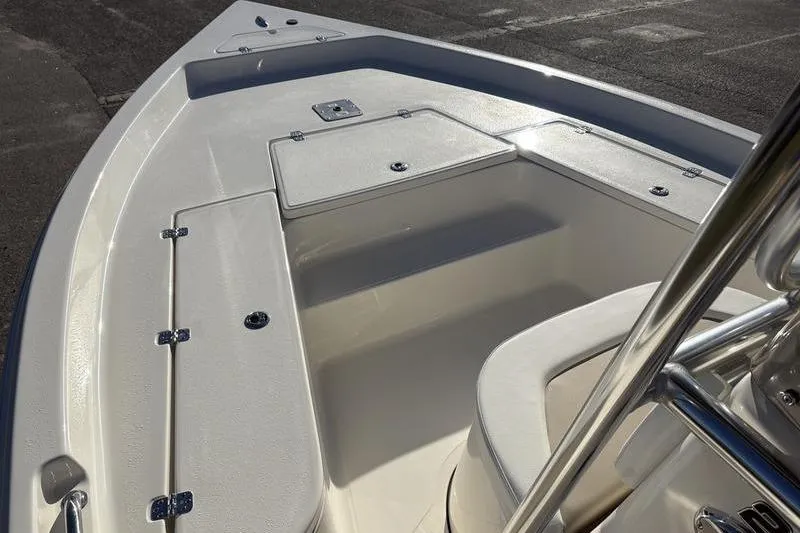 Slide: The Image of 2026 Bulls Bay 2200 XS boat interior with seating and storage compartments. - 22