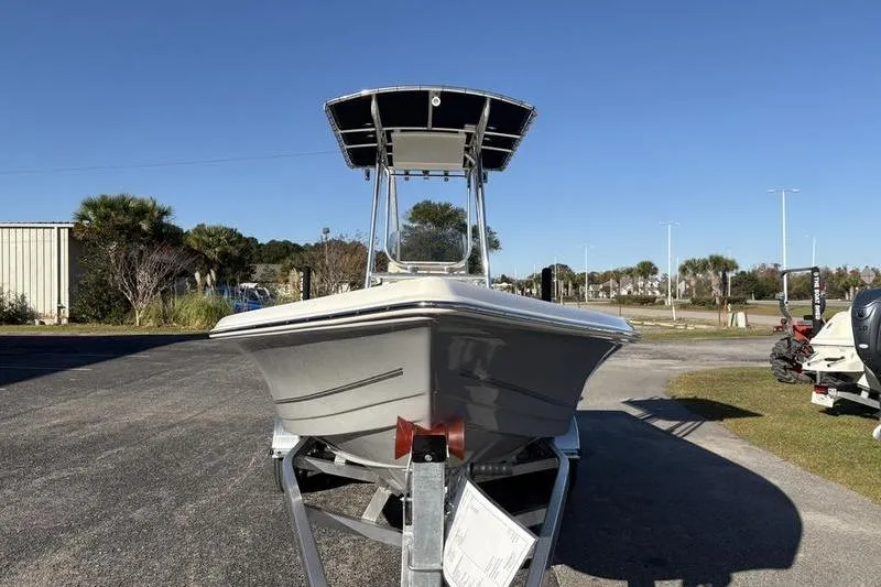 Slide: The Image of 2026 Bulls Bay 2200 XS boat on trailer under clear blue sky. - 6
