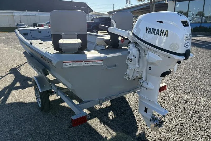 Slide: The Image of 2025 SeaArk DXS 1548 DKLD boat with Yamaha 25 outboard motor on trailer. - 7