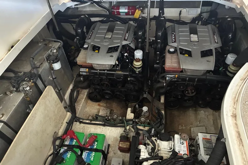 Slide: The Image of Engine room of a 2010 Sea Ray 350 Sundancer with twin MerCruiser engines. - 26