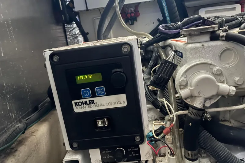 Slide: The Image of Kohler digital control panel in 2010 Sea Ray 350 Sundancer engine room. - 29