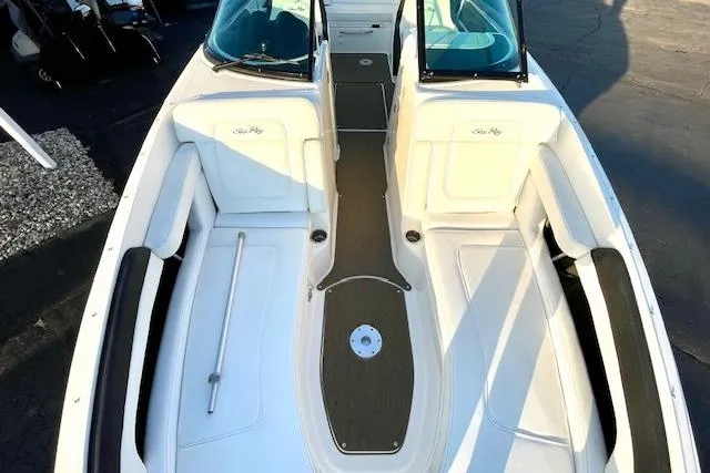 Slide: The Image of 2014 Sea Ray 260 Sundeck interior with spacious seating and sleek design. - 24