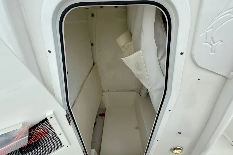 Slide: The Image of 2021 Sea Hunt BX 25 FS storage compartment interior view. - 14