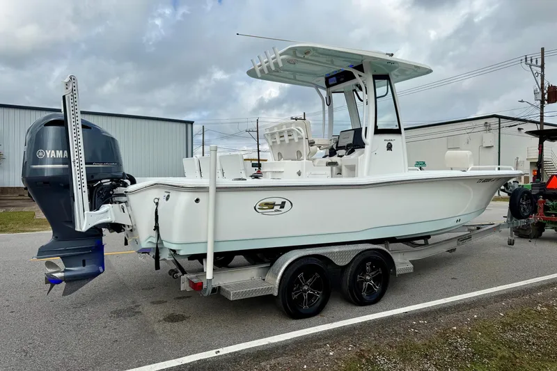 Slide: The Image of 2021 Sea Hunt BX 25 FS boat on trailer with Yamaha outboard motor. - 4