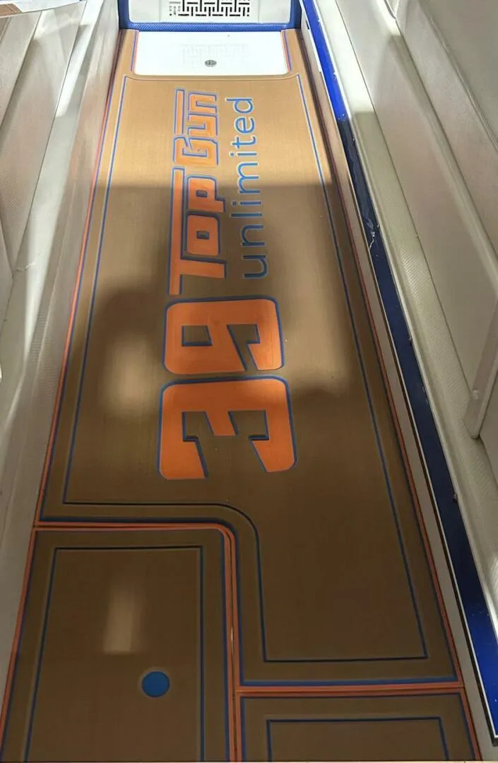 Slide: The Image of 2005 Cigarette 39 Top Gun boat interior with branded flooring design. - 10