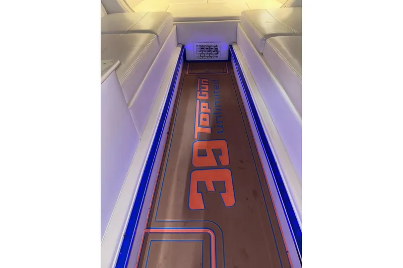 Slide: The Image of 2005 Cigarette 39 Top Gun Unlimited boat interior with illuminated flooring and seating. - 29