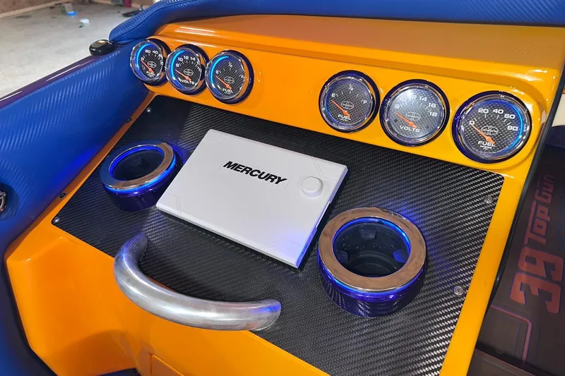 Slide: The Image of Dashboard of 2005 Cigarette 39 Top Gun Unlimited with Mercury controls and gauges. - 30