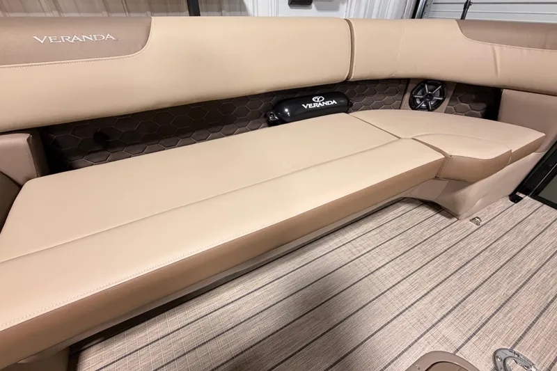 Slide: The Image of 2026 Veranda VR 265 VL boat interior with beige seating and stylish flooring. - 10