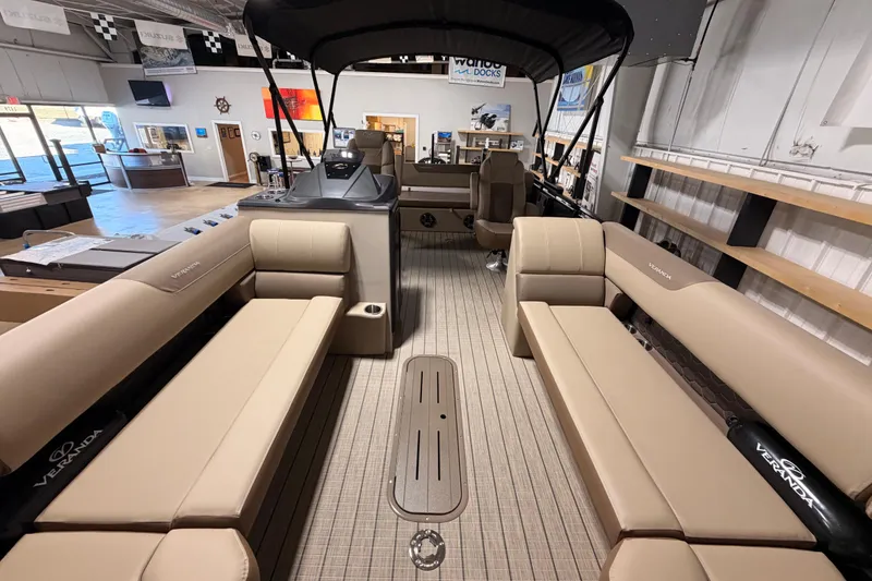 Slide: The Image of Interior view of 2026 Veranda VR 265 VL pontoon boat with beige seating. - 13