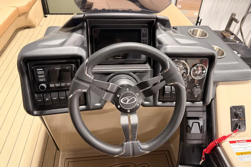 Slide: The Image of 2026 Veranda VR 265 VL boat dashboard with steering wheel and control panel. - 18