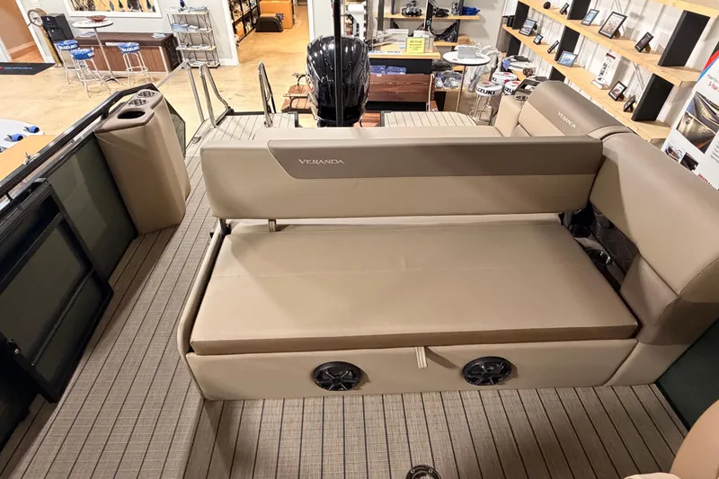 Slide: The Image of 2026 Veranda VR 265 VL pontoon boat interior with beige seating and modern design. - 20