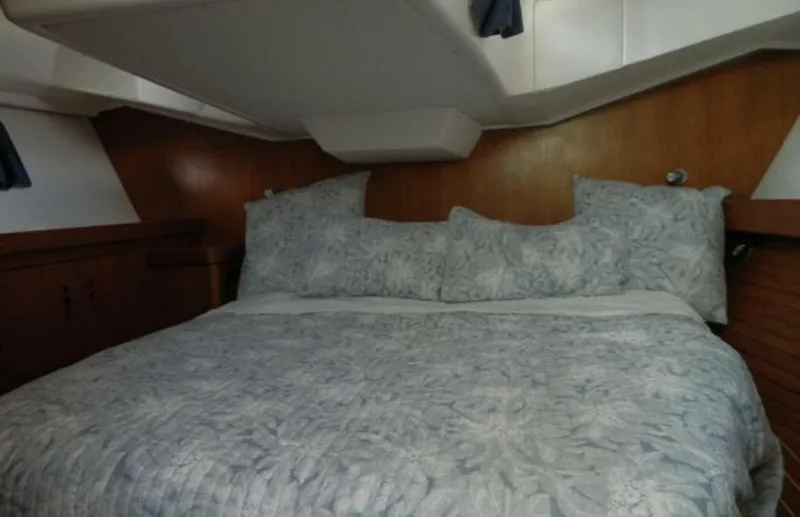 Slide: The Image of Cozy cabin interior of 2003 Wauquiez 40 Pilot Saloon with comfortable bedding. - 17