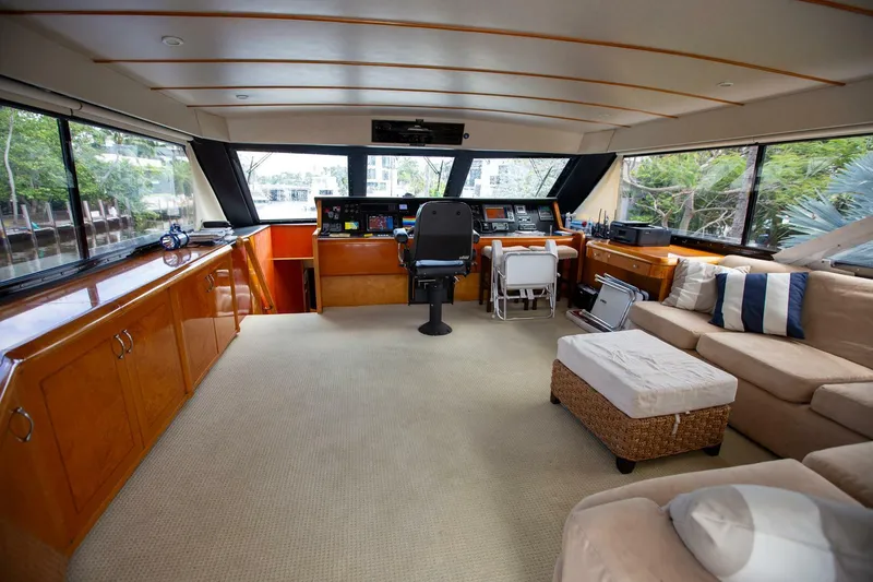 Slide: The Image of Luxurious interior of a 1999 Tarrab Motor Yacht with spacious seating and modern helm. - 26