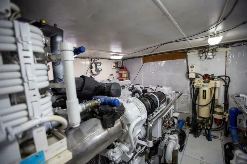 Slide: The Image of Engine room of a 1999 Tarrab Motor Yacht, showcasing machinery and equipment. - 41